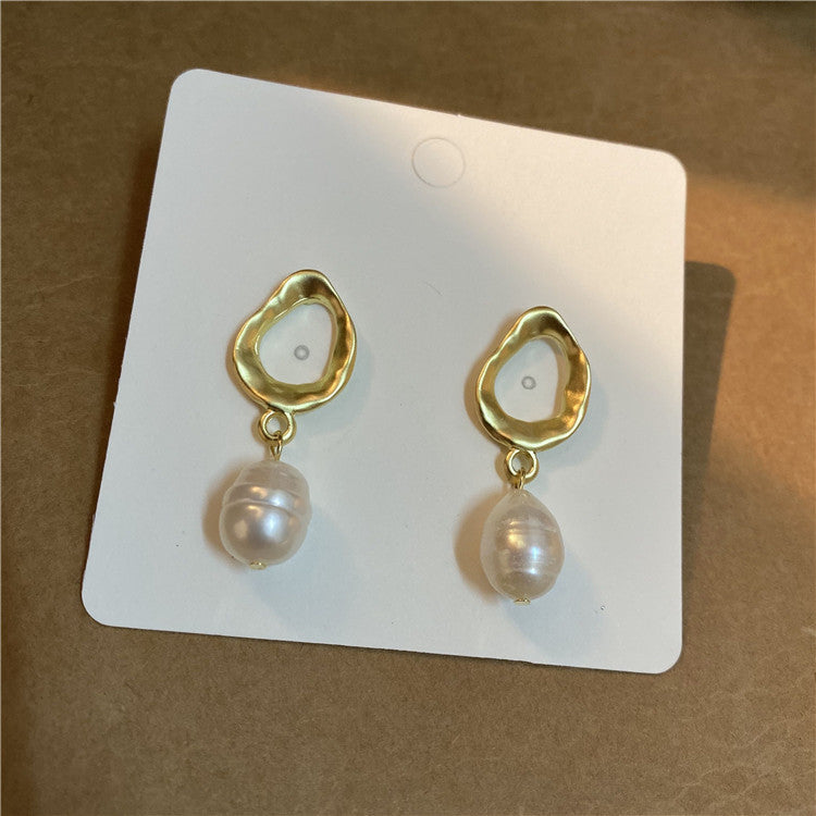 Boucles d'oreilles en perles d'eau douce avec nœud papillon